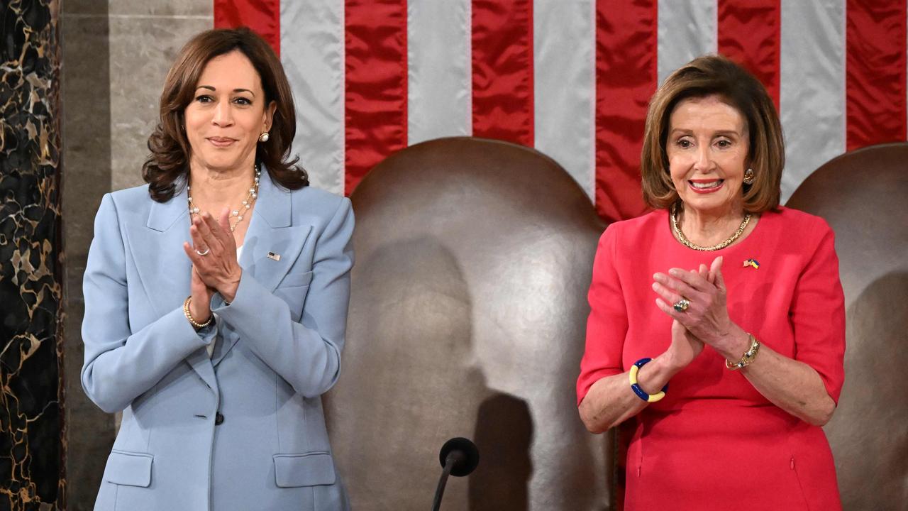 US House Speaker Nancy Pelosi and US Vice President Kamala Harris applaud prior to the address of Greek Prime Minister Kyriakos Mitsotakis during a joint session of Congress at the US Capitol in Washington, DC, on May 17, 2022. (Photo by Jim WATSON / AFP)