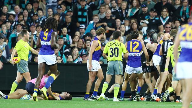 Andrew Gaff is knocked out after an incident with Tom Jonas. Picture Sarah Reed