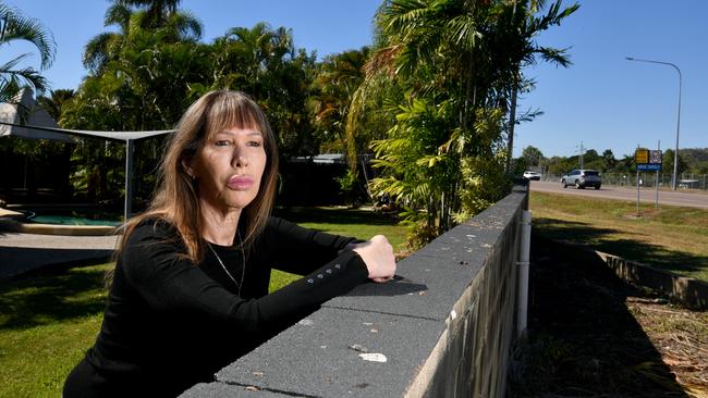 Rhonda Lapish at her Annandale home adjacent to University Drive where tree cover had been cut down. Picture: Evan Morgan