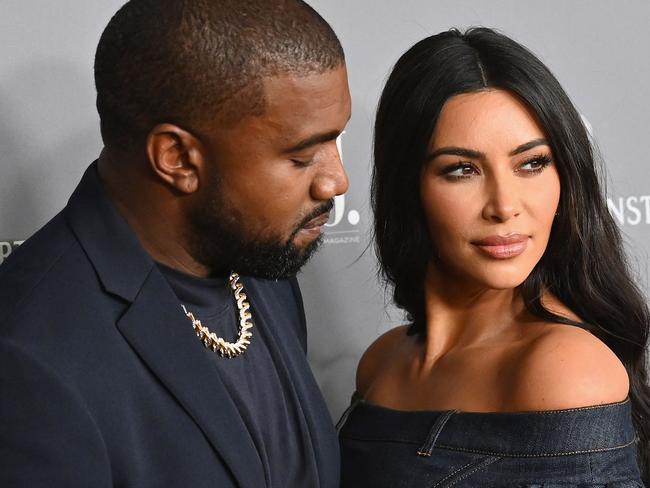 (FILES) In this file photo taken on November 06, 2019, US media personality Kim Kardashian West (R) and husband US rapper Kanye West attend the WSJ Magazine 2019 Innovator Awards in New York City. - Reality television star, influencer and business owner Kim Kardashian West is officially a billionaire, according to an estimate from Forbes, making her debut on the exclusive global list only one year after her younger sister Kylie Jenner fell off of it.  Kardashian West's money comes from TV income and endorsement deals, according to the magazine, as well as her two lifestyle brands. (Photo by Angela Weiss / AFP)