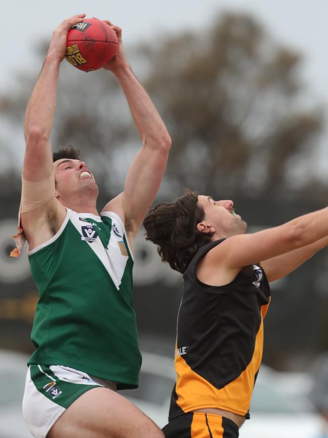 Bell Park’s Mitchell Mahady marks over Grovedale defender Brady Campi. Picture: Mark Wilson