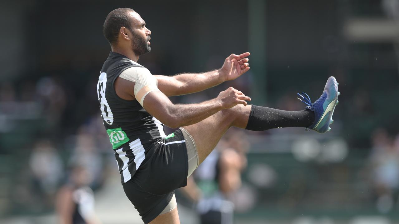 Travis Varcoe kicks at goal during the AFL JLT Community Series pre-season match against Carlton on Monday. Picture: AAP/David Crosling