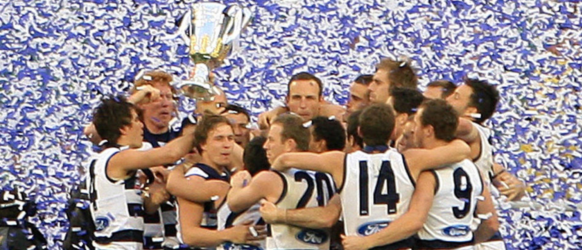 2011 Grand Final. Geelong v Collingwood. MCG. The Geelong Cats celebrate with the premiership cup