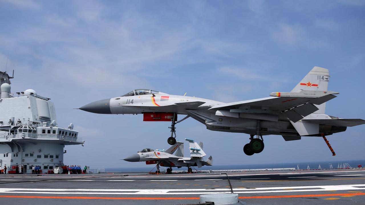 A J-15 fighter jet makes an arrested landing on the Liaoning. Picture: Li Tang/China Ministry of Defence