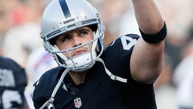 Derek Carr #4 of the Oakland Raiders celebrates after A touchdown.
