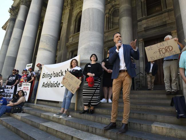 ADELAIDE, AUSTRALIA - NewsWire Photos NOVEMBER 14, 2020:  Leader of the opposition Peter Malinauskas speaks to protestors on the steps of Parliament House in North Terrace about the cancellation of the Adelaide SuperCar V8 race. Picture: NCA NewsWire / Naomi Jellicoe