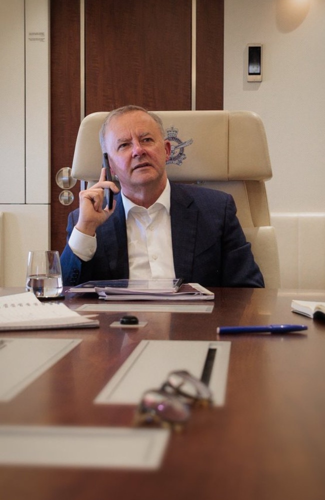 Anthony Albanese during a call with Boris Johnson on the prime ministerial plane.