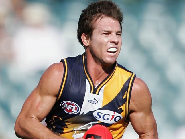 PERTH, AUSTRALIA - FEBRUARY 26: Ben Cousins of the Eagles in action during the round one NAB Cup match between the West Coast Eagles and the Fremantle Dockers at Subiaco Oval February 26, 2006 in Perth, Australia.  (Photo by Paul Kane/Getty Images)