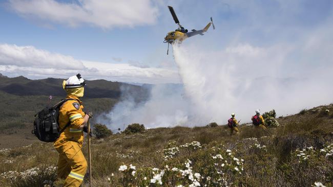 A waterbombing aircraft strafes the edge of the Gell River fire, Picture: WARREN FREY/TASMANIA FIRE SERVICE