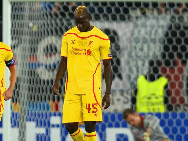 BASEL, SWITZERLAND - OCTOBER 01: Dejected Steven Gerrard and Mario Balotelli of Liverpool after conceding the first goal during the UEFA Champions League Group B match between FC Basel 1893 and Liverpool FC at St. Jakob Stadium on October 1, 2014 in Basel, Switzerland. (Photo by Jamie McDonald/Getty Images)