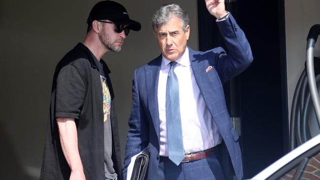 Justin Timberlake with his lawyer Ed Burke on Tuesday in The Hamptons. Credit: Matt Agudo/INSTARimages.