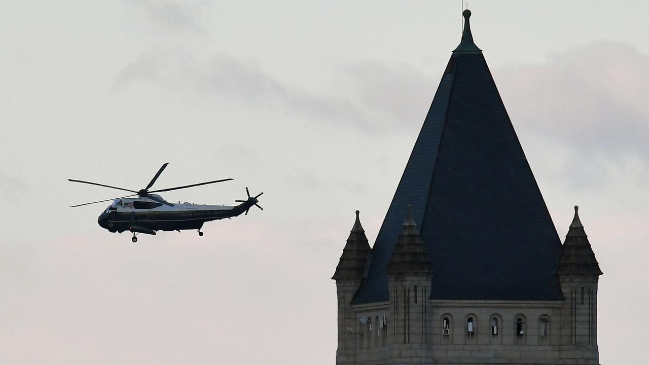 Marine One with Donald and Melania Trump passes the Trump International Hotel as it departs the White House for the last time. Picture: Olivier Douliery/Pool/AFP