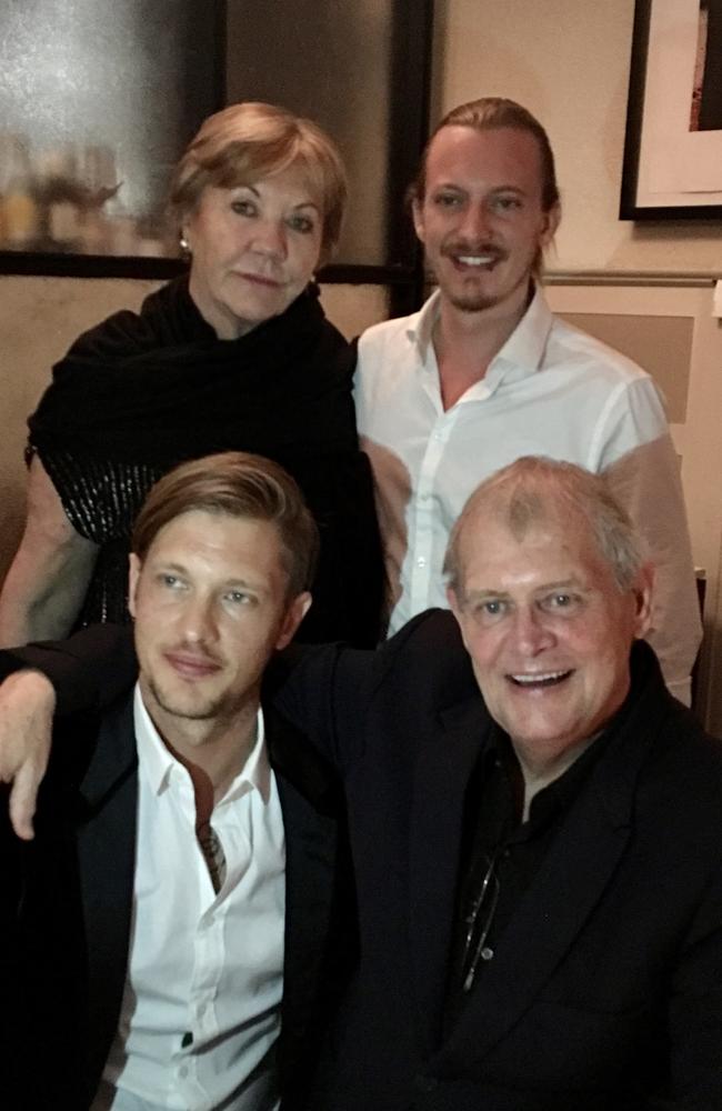 John Farnham with his wife Jill, and sons Rob (bottom left) and James. Picture: Supplied