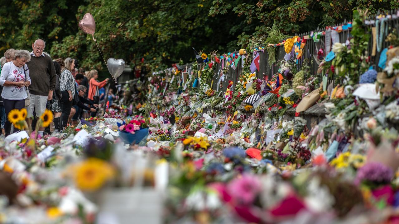 People view flowers and tributes by the botanic gardens on March 19, 2019 in Christchurch, New Zealand. Picture: Carl Court/Getty Images.