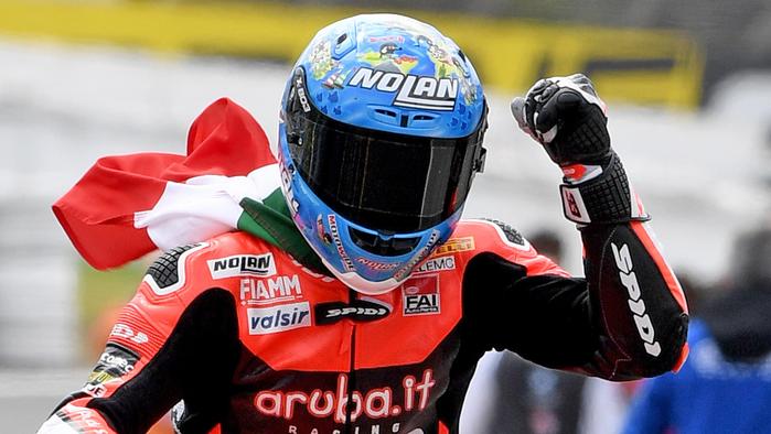 Marco Melandri of Italy from the Aruba.it Racing Ducati celebrates as he wins the first race at the World Superbike Championships at Phillip Island Circuit, Victoria, Saturday, February 24, 2018. (AAP Image/Joe Castro) NO ARCHIVING
