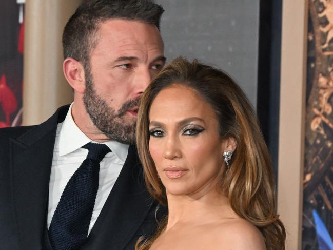 (FILES) US actress Jennifer Lopez (R) and US actor Ben Affleck attend Amazon's "This is Me... Now: A Love Story" premiere at the Dolby theatre in Hollywood, California, February 13, 2024. Jennifer Lopez said on May 31, 2024 that she was cancelling her summer tour to spend more time with her family as rumors circulate over a split with actor-husband Ben Affleck. (Photo by Robyn BECK / AFP)