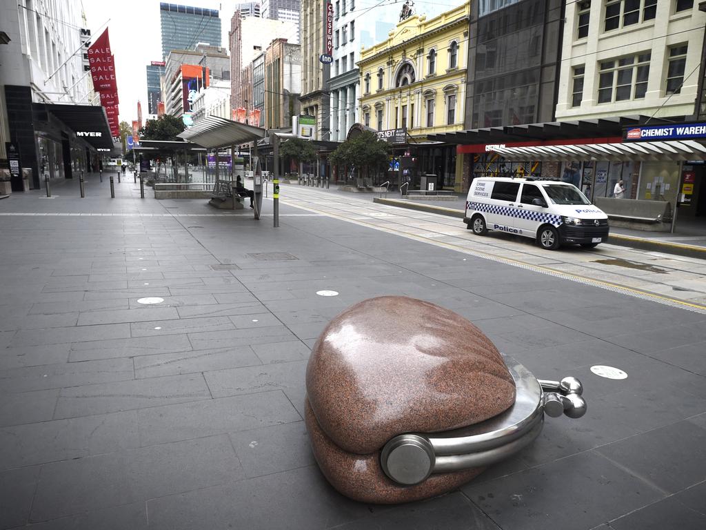 Eerie scenes show a nearly empty Bourke St. Picture: NCA NewsWire / Andrew Henshaw