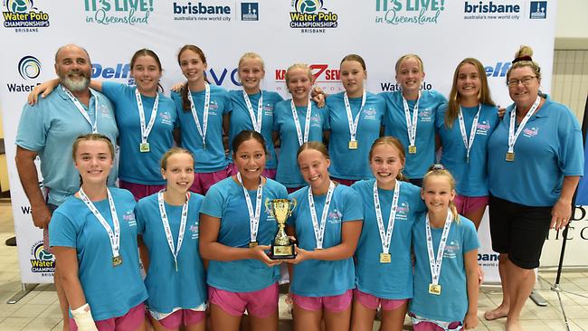 The under 14 Mermaids Pink water polo team with a national medal.