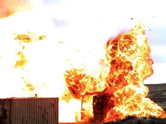 A Tomahawk Weapon System fired from HMAS Brisbane off the coast of San Diego, USA, impacts it's target. Screenshot from video capture. *** Local Caption *** The Royal Australian Navy is accelerating the Tomahawk Weapon System installation in Surface Combatants culminating in a live firing from a Hobart class destroyer 2024. This is aligned to Government Direction announced in the 2023 Defence Strategic Review and in the 2024 National Defence Strategy.