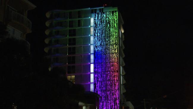 Photos of Lindy Lee's artwork which is on the side of the Awaken Residences tower in Rainbow Bay. Picture: Supplied