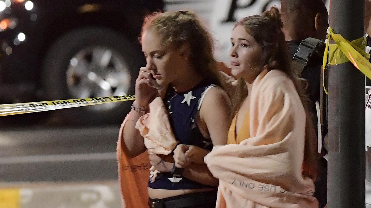 People walk away from the scene in Thousand Oaks. Picture: AP