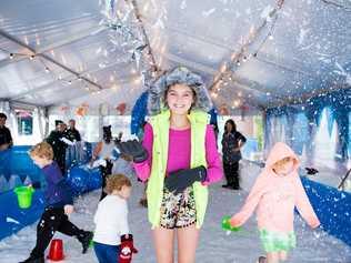 Twelve year old Abbie Dawes enjoys Grand Central's snow pit in Central Square. Picture: Contributed