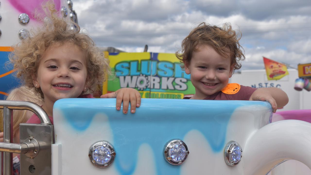 (L) Lillian Facuri Gois and Oscar Gardner Sesar enjoy the teacup ride at the Fraser Coast Ag Show. Photo: Stuart Fast