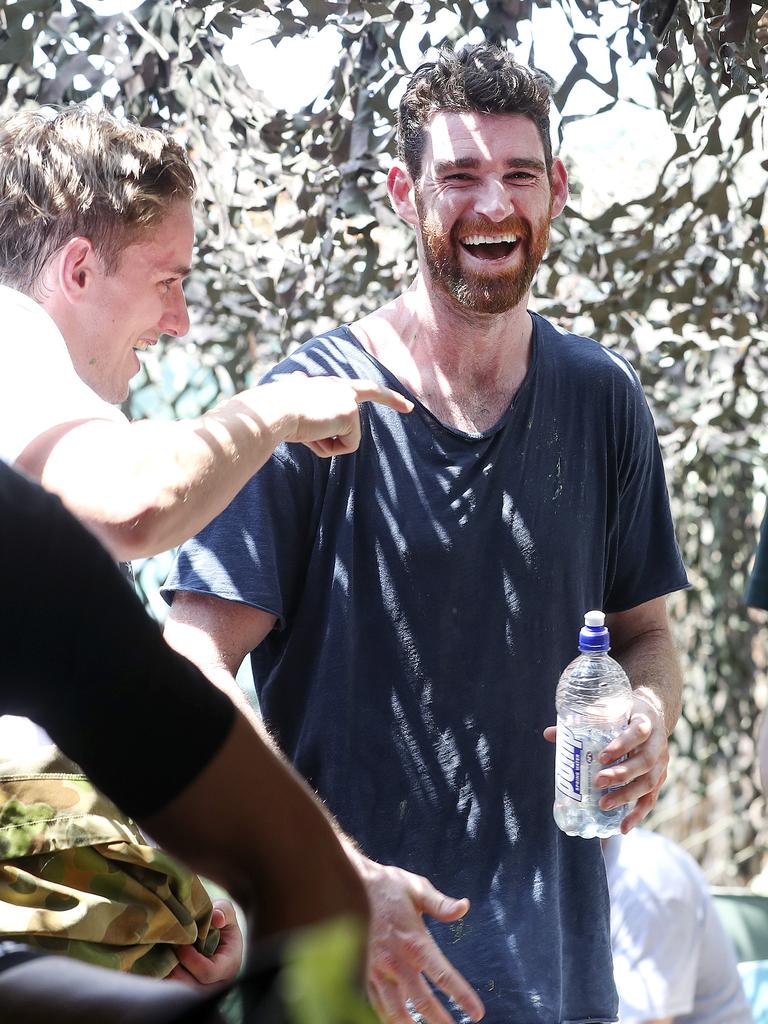 Goldsack has a laugh with the Power players during their pre-season camp at Maroochydore. Picture: Sarah Reed.