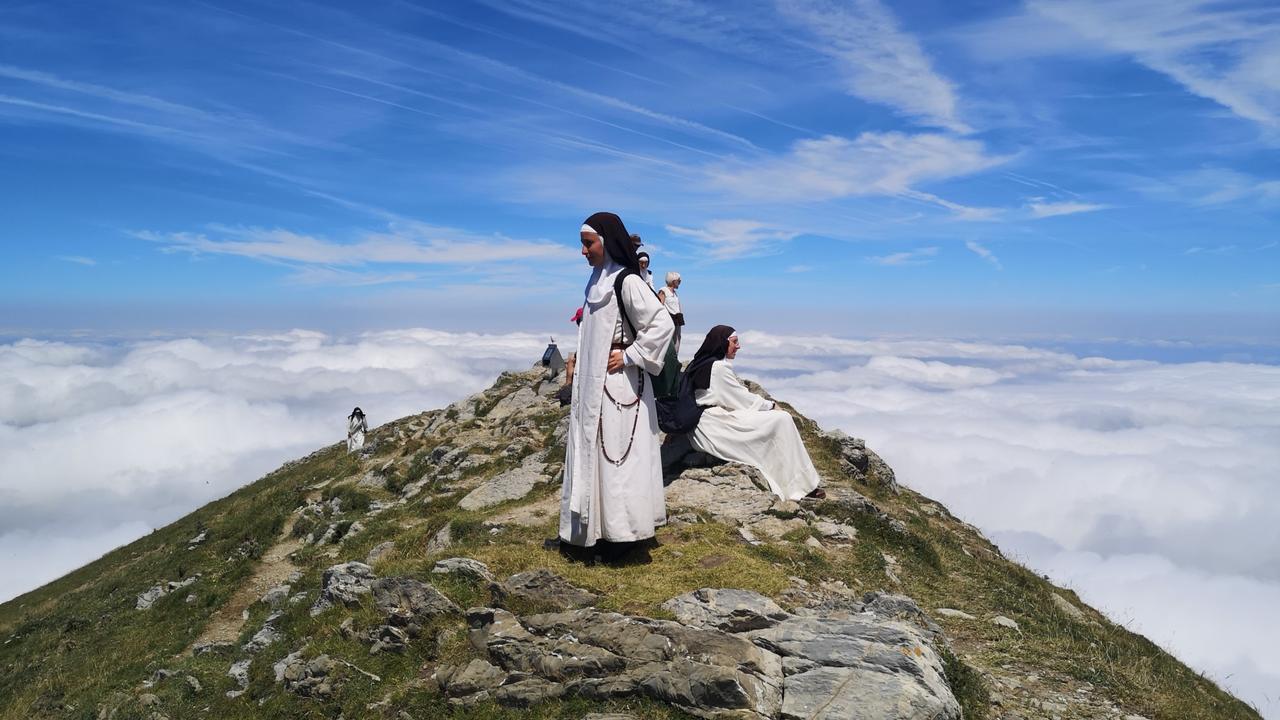 A convent of nuns mountain take a break while walking on Pic d'Orhy in the Pyrenees. Picture: Paul Robertson