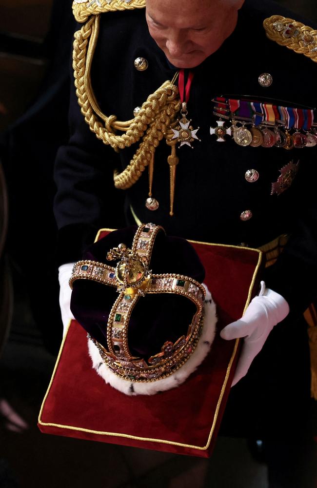 17th Century St Edward’s Crown is carried at Westminster Abbey. Picture: PHIL NOBLE / POOL / AFP