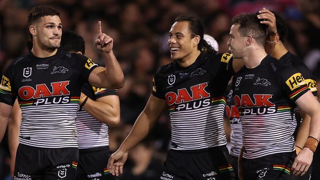 PENRITH, AUSTRALIA - SEPTEMBER 09:  Dylan Edwards of the Panthers celebrates with Jarome Luai of the Panthers and Nathan Cleary of the Panthers after scoring a try during the NRL Qualifying Final match between the Penrith Panthers and the Parramatta Eels at BlueBet Stadium on September 09, 2022 in Penrith, Australia. (Photo by Mark Kolbe/Getty Images)