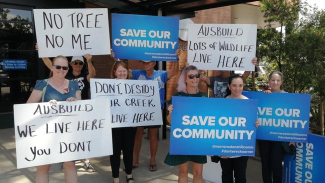 Residents outside the council chamber after Ausbuild's Warner Rd development application was rejected. Picture: David Alexander