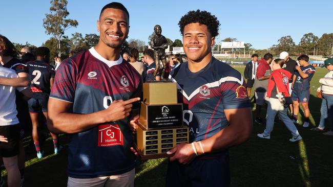 Cronulla player Ronaldo Mulitalo with Ipswich SHS player Josiah Pahulu. Picture: NIGEL HALLETT