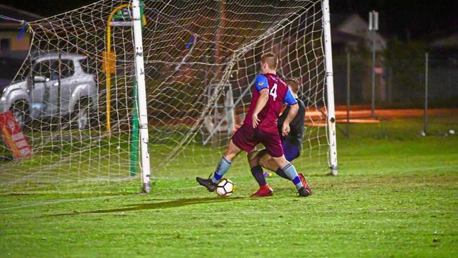 ON A ROLL: Brothers Aston Villa's Jaryd Bennier taps the ball past the United Warriors goal keeper to score one of his nine goals on the night. Picture: Brian Cassidy