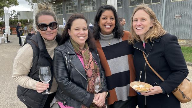 Taking a break from wine tasting to enjoy some loukoumades and ice cream from Alatonero were (left to right) Michelle Murray, Ringwood, Melanie Miller, Richmond, Romayne Perea, South Yarra and Lisa Flower, South Melbourne. Picture: Lucy Callander