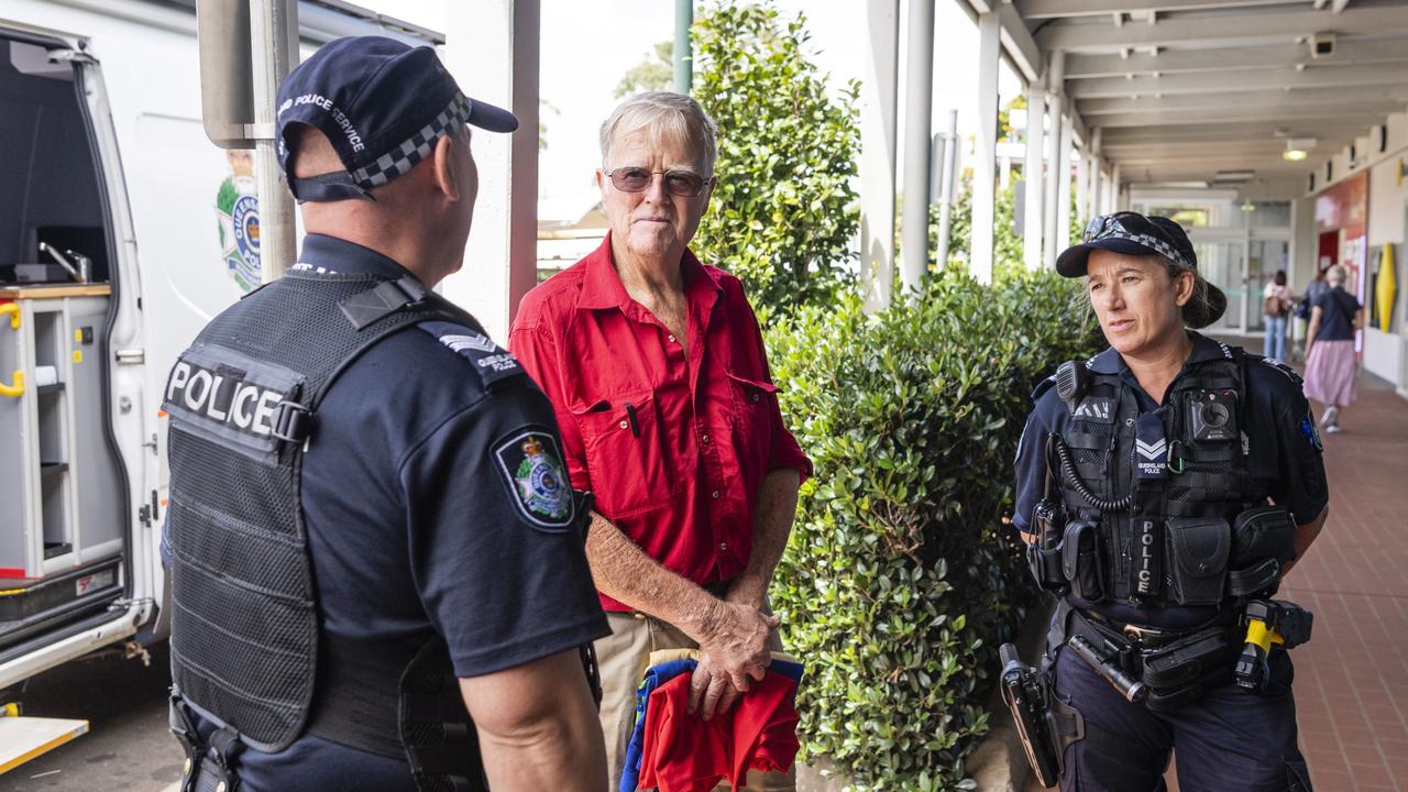 Senior Constable Neil Ault and Senior Constable Joanne Bailey chat with Ray Croft outside the Mobile Police Beat parked at Clifford Gardens Shopping Centre. Picture: Kevin Farmer