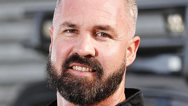 Senior Constable Aaron Izzard posing at Public Safety Response Team (PSRT), Brisbane 2nd of July 2019.  Aaron was critically injured and on life support in September last year.  (AAP Image/Josh Woning)