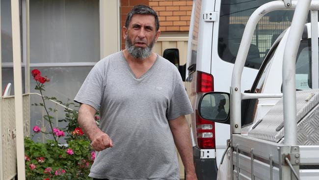 Armagan Eriklioglu, 51, at his Campbellfield home after he was bundled to the ground and had a rifle pointed at his head during the arrests of his two sons early yesterday. Picture: David Geraghty