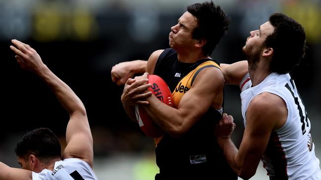 Daniel Rioli takes a contested mark against St Kilda.