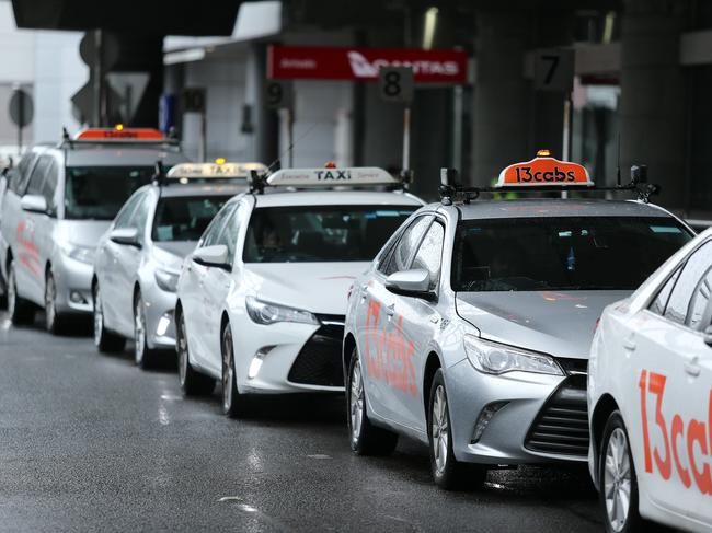 Taxis queued at Sydney Airport domestic terminal. Picture: Tim Hunter.