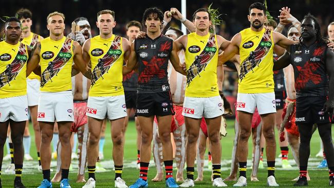 Indigenous players come together before the annual Dreamtime game. (Photo by Quinn Rooney/Getty Images)