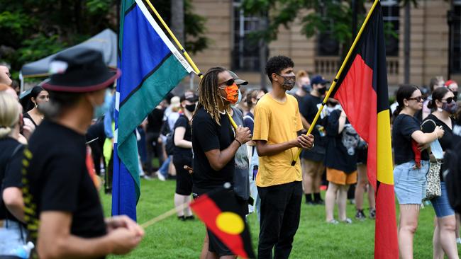 People take part in an Invasion Day protest in central Brisbane this year. Picture: NCA NewsWire / Dan Peled