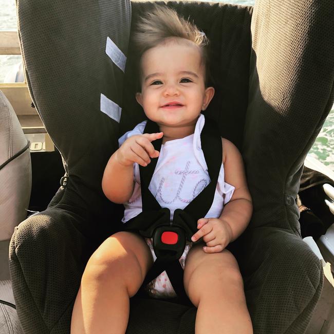 Pippa Ilett; a true Territory kid. Daddy strapped her car seat to a seat in the boat for a sunset cruise on the harbour. Picture: Erin O’Connell