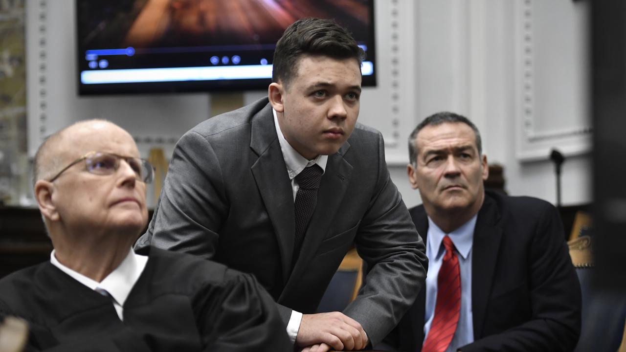 Judge Bruce Schroeder, left, and Kyle Rittenhouse, centre, during the trial. (Photo by Sean Krajacic-Pool/Getty Images)