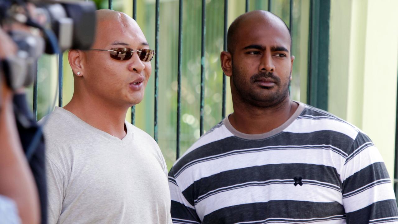 Myuran Sukumaran, right, and Andrew Chan, left, stand in front of their cell in 2011. Picture: AP Photo/Firdia Lisnawati, File