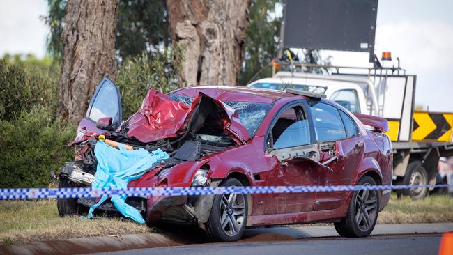 A mangled Holden at the scene of a fatal crash on Hall Rd in Carrum Downs. Picture: Mark Stewart