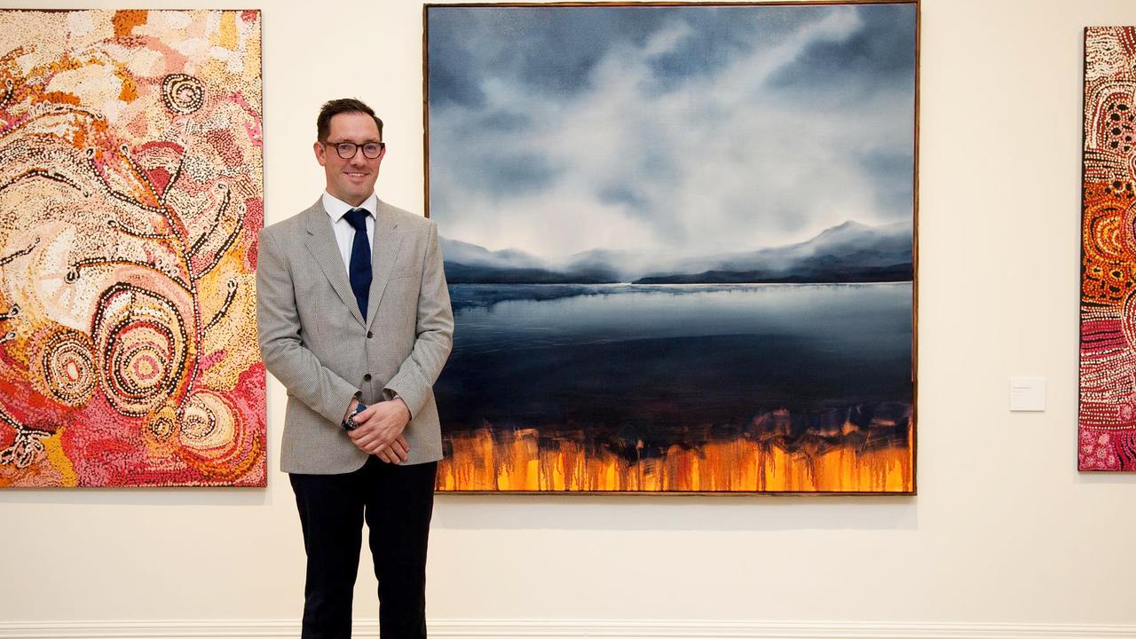 Tasmanian artist Joshua Andree with his work Once Still Water (Requiem for a Lake) that is the Hadley's Art Prize People's Choice Award winner for 2023. Picture: supplied