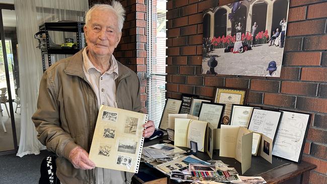 Colin Wagener with his army service memorabilia.