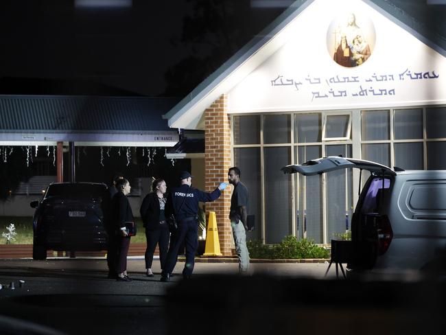 Forensic officers collecting evidence at the Christ The Good Shepherd Church in Wakeley after the terror attack and riot last night. Picture: Jonathan Ng