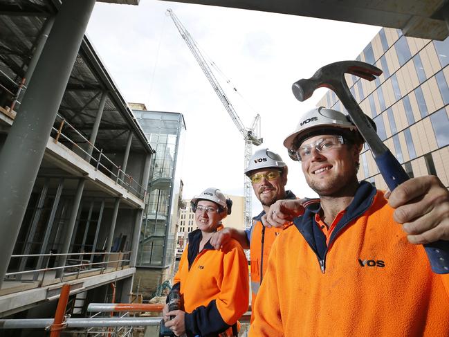 Second year apprentice Bree Kelly, left, site manager Dallas Millhouse and tradesman Matt Fielding at the Parliament Square redevelopment in Hobart. Picture: CHRIS KIDD